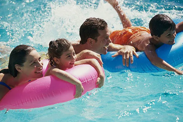 kids swimming in the pool